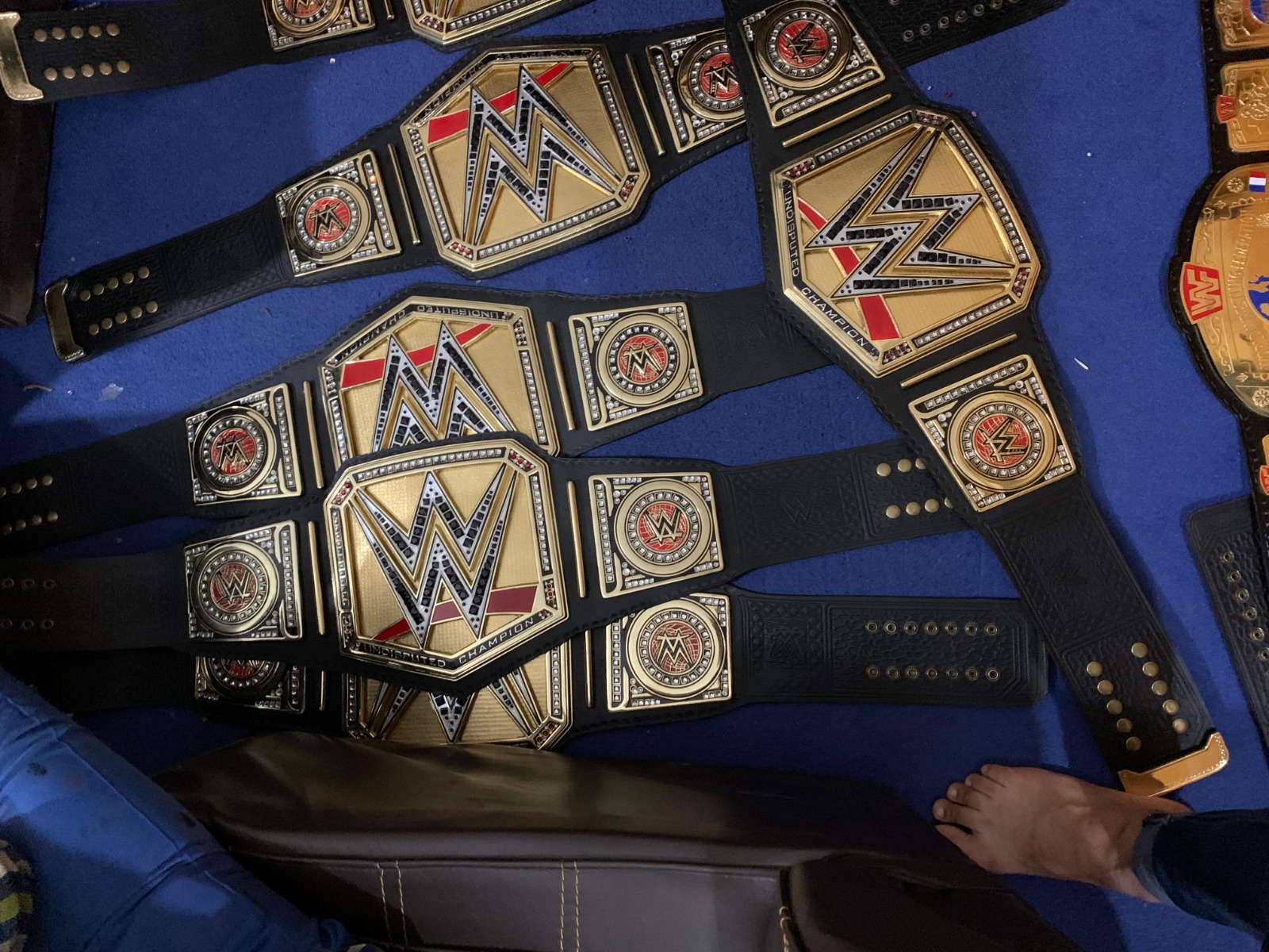 Close-up of championship belt zinc plate engraving process