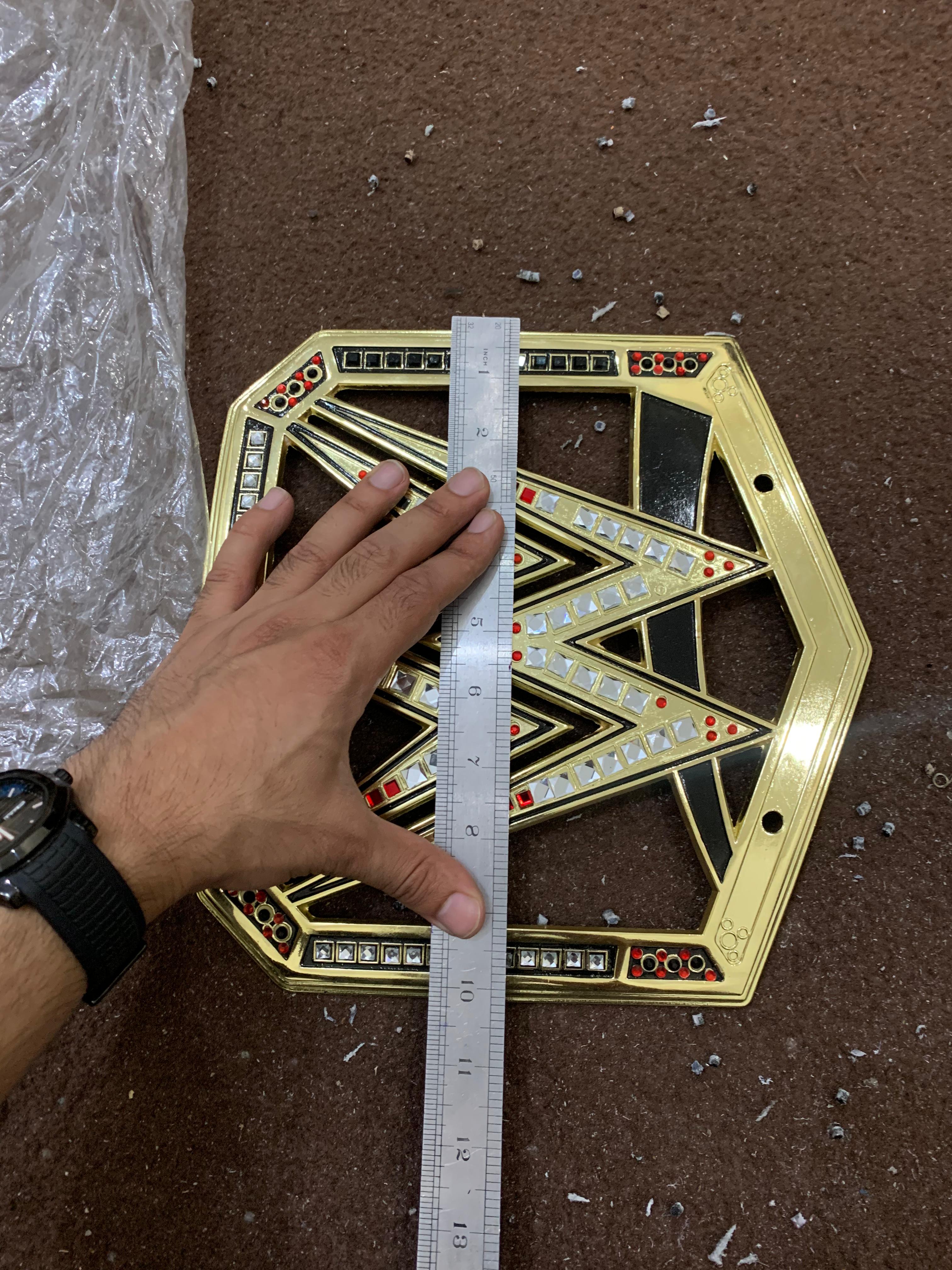Championship belt final quality inspection before packaging