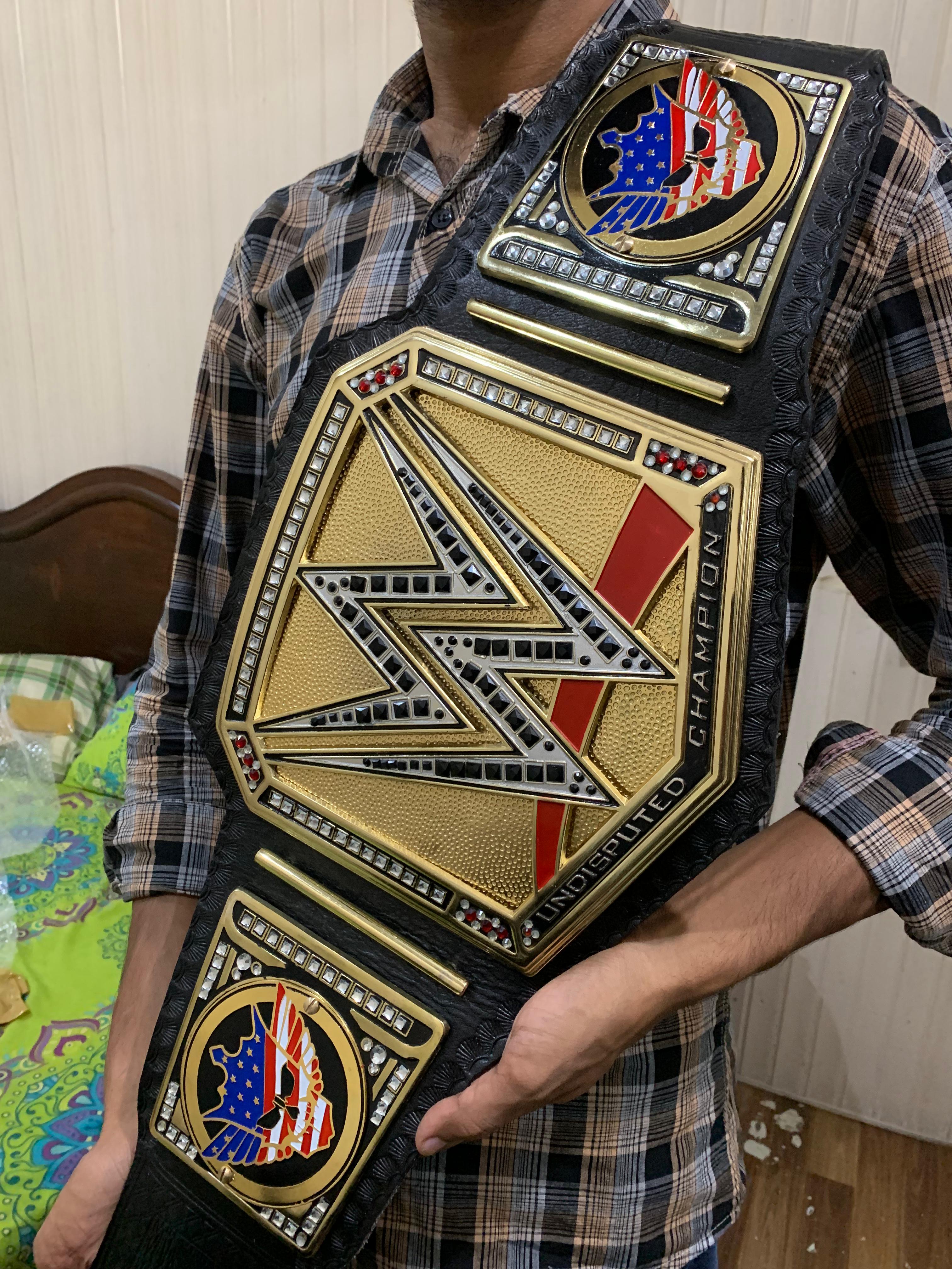 Championship belt centre plate — gold engraving and eagle design detail